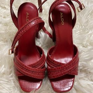 Open toe red croc platform heels